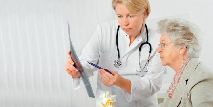 the doctor prescribes treatment for lower back pain